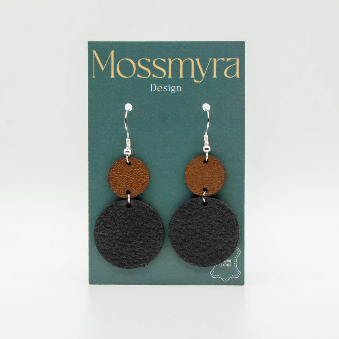 Runda i svart och brun